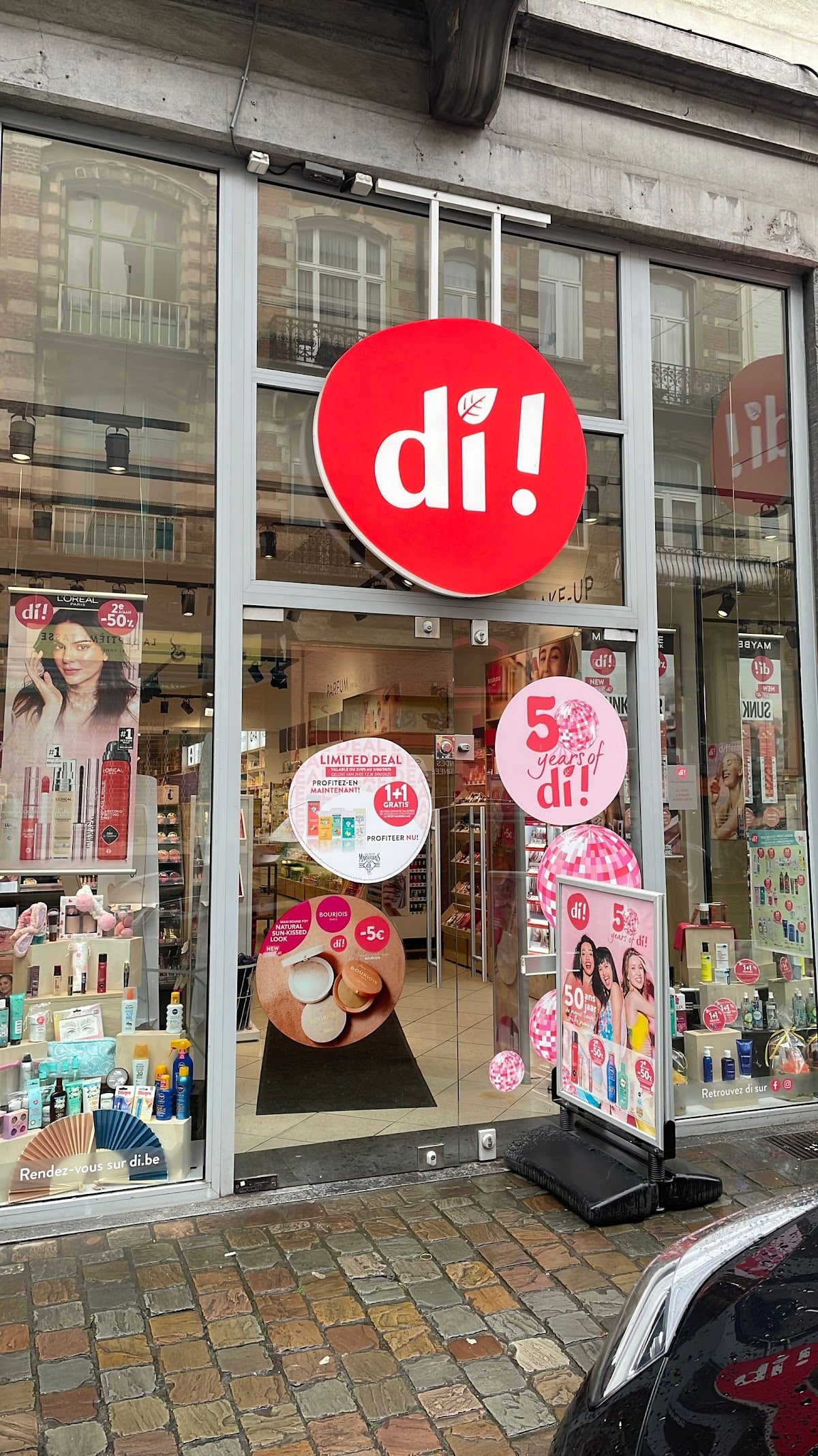 Di